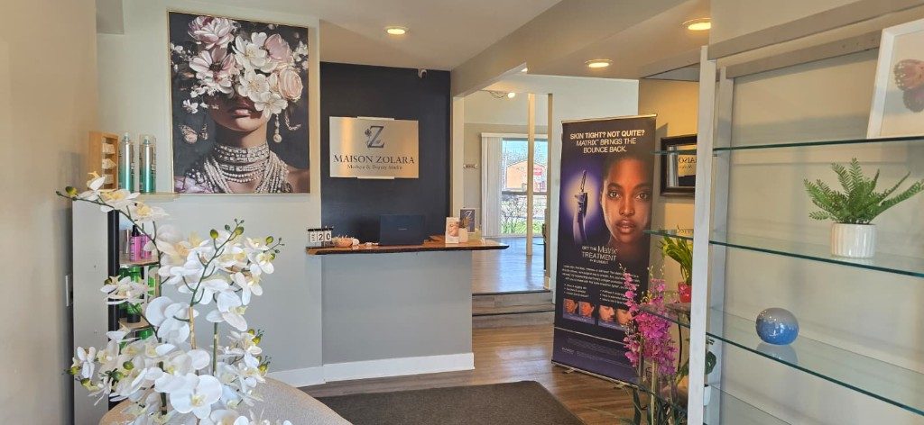 Maison Zolara reception desk and lobby in Lansing Michigan medspa and beauty studio