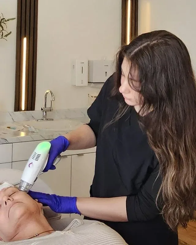 RN performing RF microneedling treatment at Maison Zolara, Lansing MI