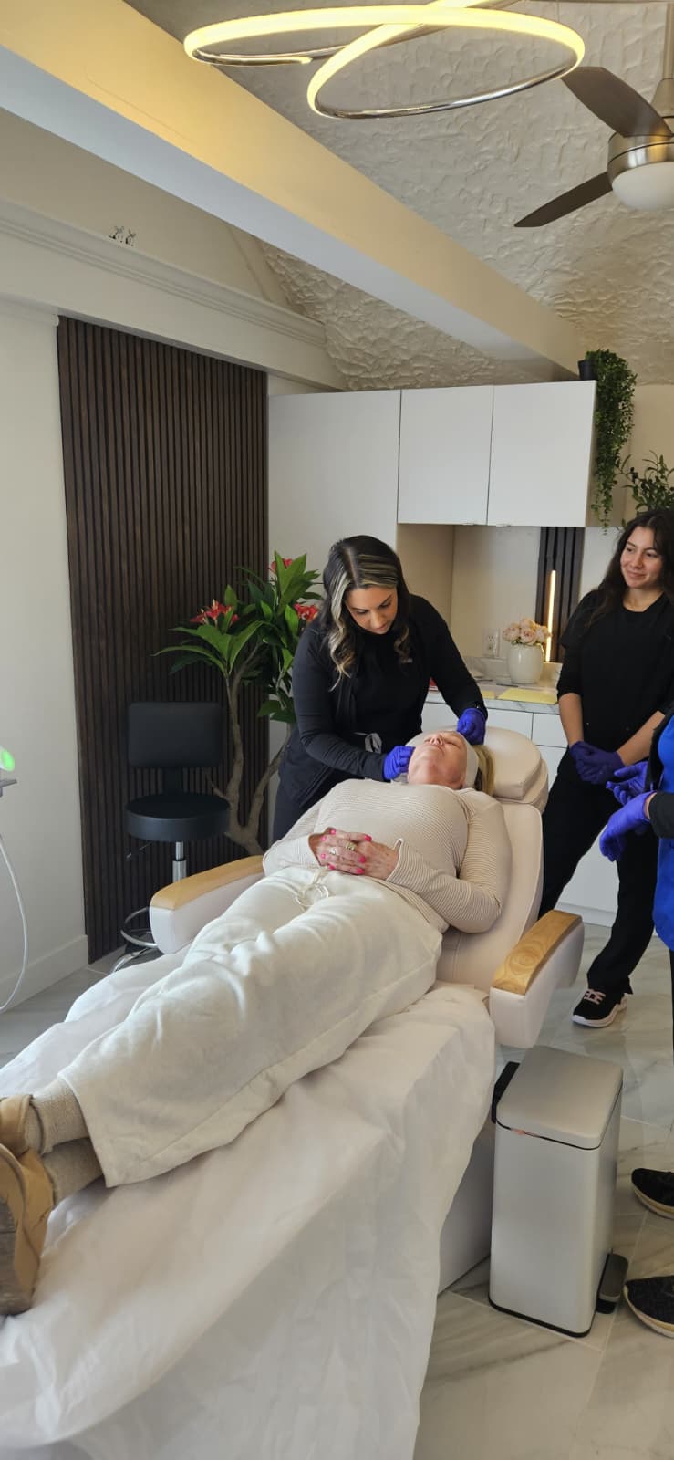 Licensed RN clinicians performing RF microneedling at Maison Zolara
